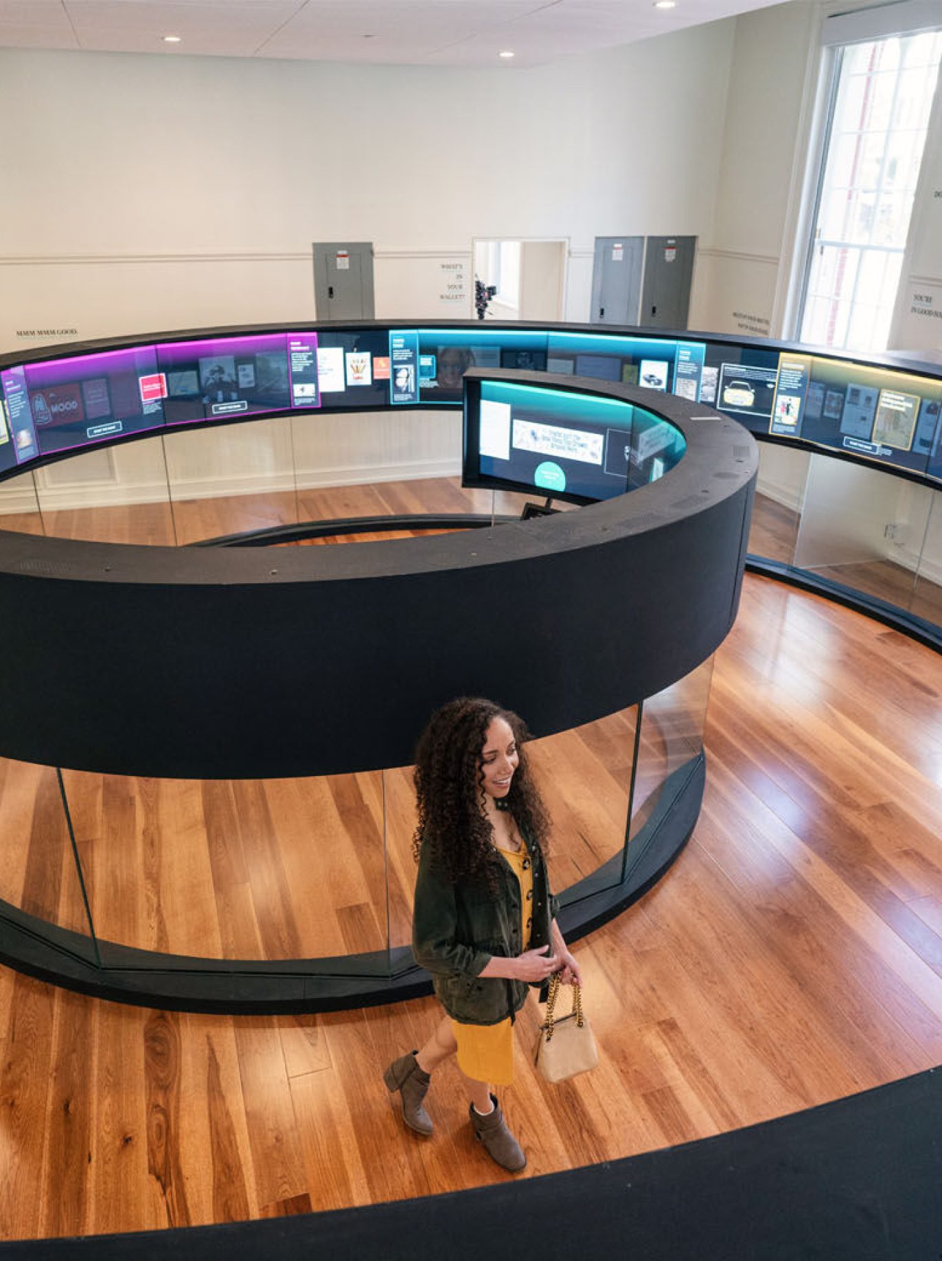 Voice-activated exhibits include “Where Do Words Come From,” a 22-foot-tall talking word wall, an acoustically-sealed room where visitors use a teleprompter to deliver their own versions of historic speeches and a karaoke lounge. (Courtesy DuHon Photography/Long Story Short Media)